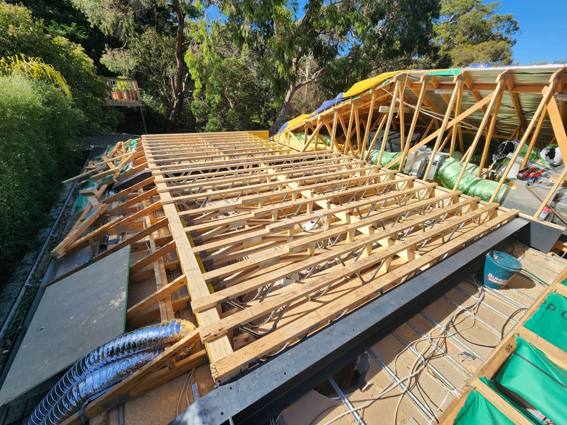 Timber roof trusses and ceiling battens over a new extension